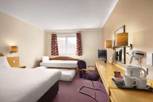 Family Room (One Double & Two Singles) room in Days Inn Hamilton