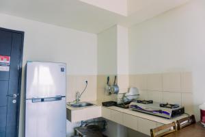 Fancy and Nice 1BR at Paramount Skyline Apartment By Travelio