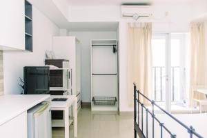 Nice and Cozy Studio at Paramount Skyline Serpong Apartment By Travelio
