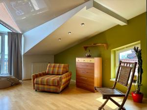 Dviaukštis butas Nidos centre, su panoraminiu vaizdu į marias