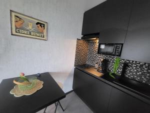 Studio avec salle de douche cosy à La Panne avec balcon by La Conciergerie