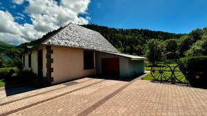 Maisons de vacances L'ecole du Hameau 9pers Le Mont Dore : photos des chambres
