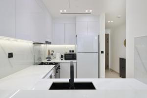 Chic 1BR in JVC with Balcony, Near Mall & Parks