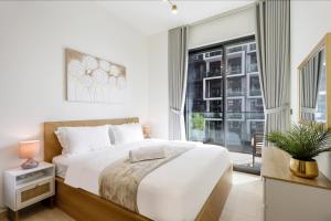 Chic 1BR in JVC with Balcony, Near Mall & Parks