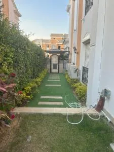 Next to the Drive 2 and Al Ahli Club - New cairo