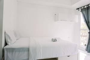 Homey and Good Deal Studio Casa de Parco Apartment By Travelio
