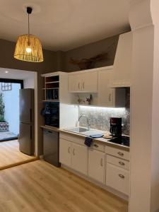 Maisons de vacances Maison de ville avec patio : photos des chambres