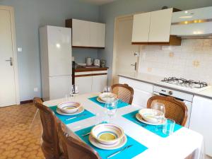 Appartements Chez Tata Malou - Maison avec jardin, cour fermee, proche toutes commodites : photos des chambres