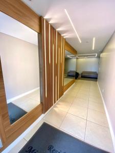 Belo apto com lindo jardim em Capão da Canoa