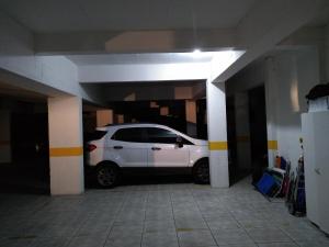 Belo apto com lindo jardim em Capão da Canoa