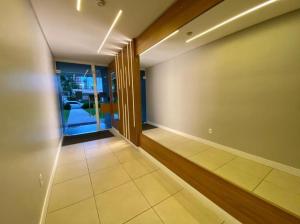 Belo apto com lindo jardim em Capão da Canoa