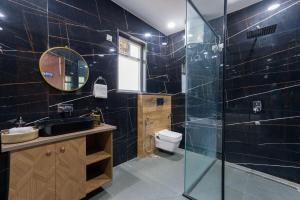 ELIVAAS AdhiVa 5-BHK Farmhouse with Private Pool, Bar & Lush Garden