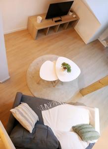 Appartements studio en mezzanine, metro et rue centrale mais calme : photos des chambres