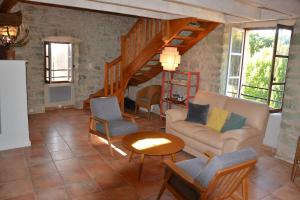 Appartements Mas en pierre XIXe, piscine et grande propriete, atelier ceramique et poterie : photos des chambres