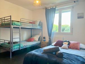 Maisons de vacances Maison des Pins - Jardin, calme et plage - Lock-inn : photos des chambres