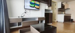 Supalai Mare 1-Bedroom Condo with Balcony & Sea View