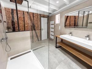 Appartements Studio de charme 70m2, Jacuzzi et Piscine Partagee : photos des chambres