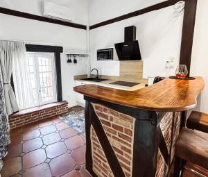 Appartements Studio de charme 70m2, Jacuzzi et Piscine Partagee : photos des chambres