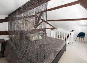 Appartements Studio de charme 70m2, Jacuzzi et Piscine Partagee : photos des chambres