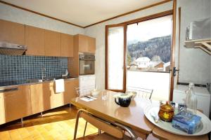 Appartements Plein-Sud - Parking & Vue Montagnes : photos des chambres