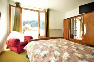 Appartements Plein-Sud - Parking & Vue Montagnes : photos des chambres