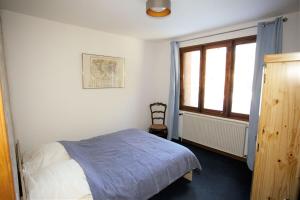 Appartements Plein-Sud - Parking & Vue Montagnes : photos des chambres