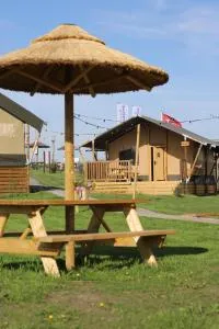 Safaritent Wood XL met tuinzicht - Leimuiden