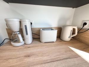 Appartements Les Reflets du Chateau - Parking Gratuit - Cosy & Moderne - Route des vins : photos des chambres