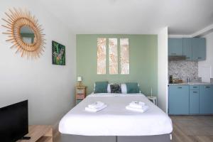 Appartements Studio 30 m2 tout confort - RER a 3 min, acces Paris & Disneyland : photos des chambres