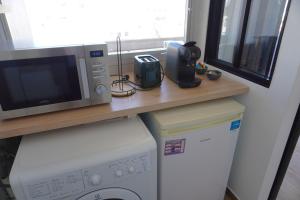 Appartements Studio cosy devant RER B TGV Massy SNCF : photos des chambres