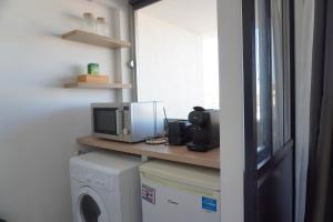 Appartements Studio cosy devant RER B TGV Massy SNCF : photos des chambres