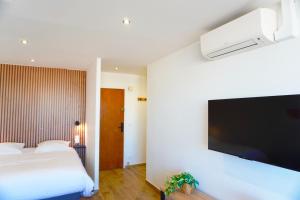 Appartements Studio cosy devant RER B TGV Massy SNCF : photos des chambres