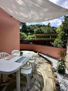 Terrace & Parking - Holiday Home near Fegina Beach