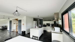 Villas Le confort contemporain dans un ecrin de verdure : photos des chambres