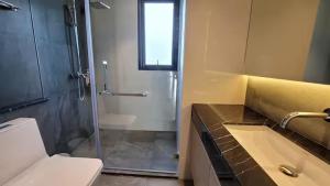 luxury Andromeda apartment with spacious bedroom and views of the sea and sunny landscapes