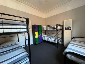 Bed in Mixed 5-Bed Dormitory Room with Private Bathroom room in Manly Bunkhouse