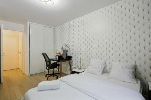 Appartements Le cocon urbain - Gare 220m - Parking prive - Pres de Paris - Proche La Defense : photos des chambres