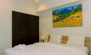 A Luxury 1BR Bali Style Apartment at Branz BSD City By Travelio