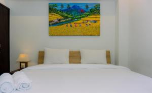 A Luxury 1BR Bali Style Apartment at Branz BSD City By Travelio