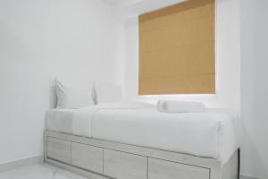 Comfort Studio at Menteng Square Apartment By Travelio