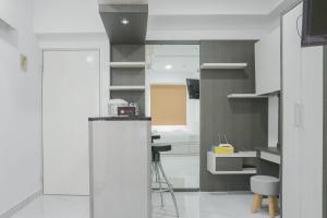 Comfort Studio at Menteng Square Apartment By Travelio