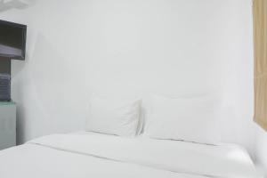 Comfort Studio at Menteng Square Apartment By Travelio