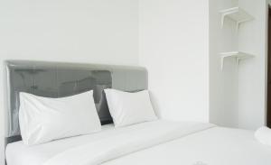 Cozy Studio at Amazana Serpong Apartment By Travelio