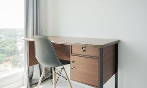 Cozy Studio at Amazana Serpong Apartment By Travelio