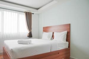 Best Homey Elegant Studio Room at Amethyst Apartment By Travelio