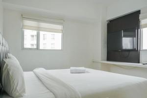 Best Location 2BR at The Wave Kuningan Apartment By Travelio