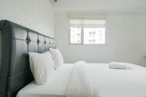 Best Location 2BR at The Wave Kuningan Apartment By Travelio