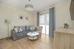 Jasny Apartament Sun Seasons 24 z Umeblowanym Balkonem i Parkingiem by Noclegi Renters