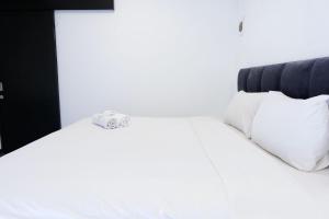 Prime and Spacious 2BR at Apartment Grand Asia Afrika By Travelio