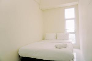 Minimalist Studio at Akasa Pure Living BSD Apartment By Travelio